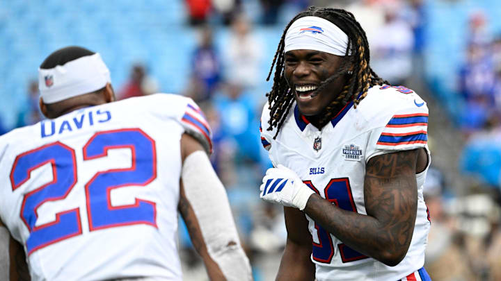 Oct 26, 2025; Charlotte, North Carolina, USA; Buffalo Bills running back Ray Davis (22) celebrates with cornerback Maxwell Hairston (31) after a game against the Carolina Panthers at Bank of America Stadium.