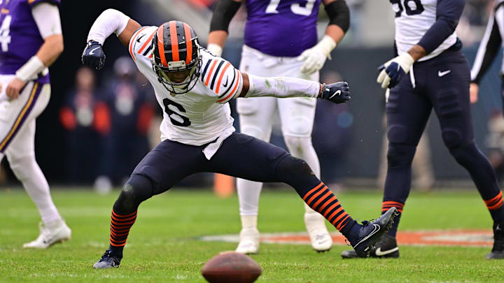 Nov 24, 2024; Chicago, Illinois, USA; Chicago Bears cornerback Kyler Gordon (6) celebrates a defensive stop on 4th down against the Minnesota Vikings during the fourth quarter at Soldier Field. Mandatory Credit: Daniel Bartel-Imagn Images