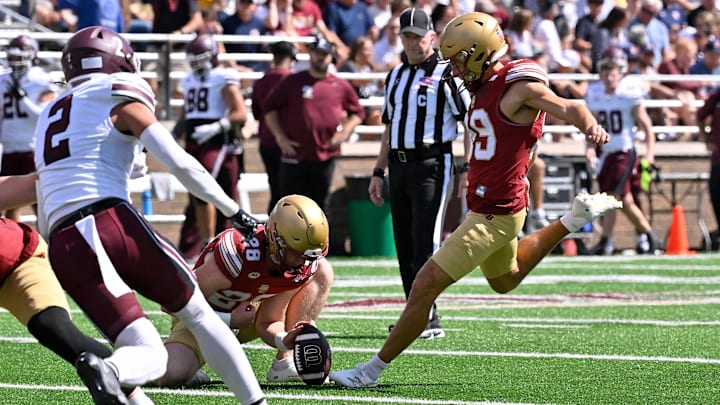 Aug 30, 2025; Chestnut Hill, Massachusetts, USA; Boston College Eagles place kicker Luca Lombardo (99) kicks an extra point against the Fordham Rams during the first half at Alumni Stadium. Mandatory Credit: Eric Canha-Imagn Images Aug 30, 2025; Chestnut Hill, Massachusetts, USA; Boston College Eagles place kicker Luca Lombardo (99) kicks an extra point against the Fordham Rams during the first half at Alumni Stadium. Mandatory Credit: Eric Canha-Imagn Images