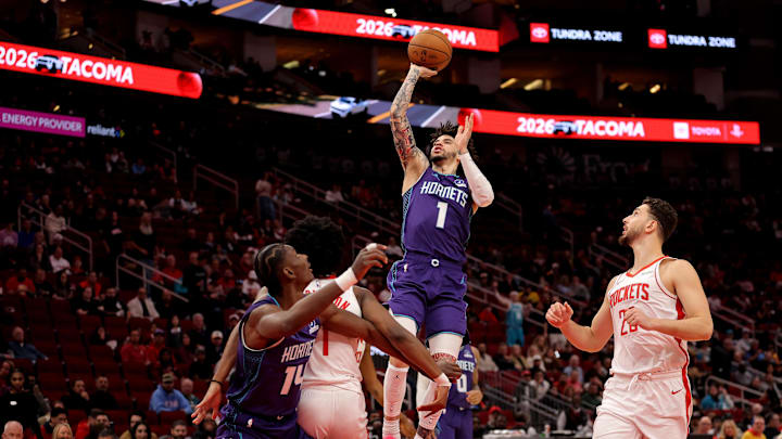 Feb 5, 2026; Houston, Texas, USA; Charlotte Hornets guard LaMelo Ball (1) shoots against the Houston Rockets during the first quarter at Toyota Center. Mandatory Credit: Erik Williams-Imagn Images