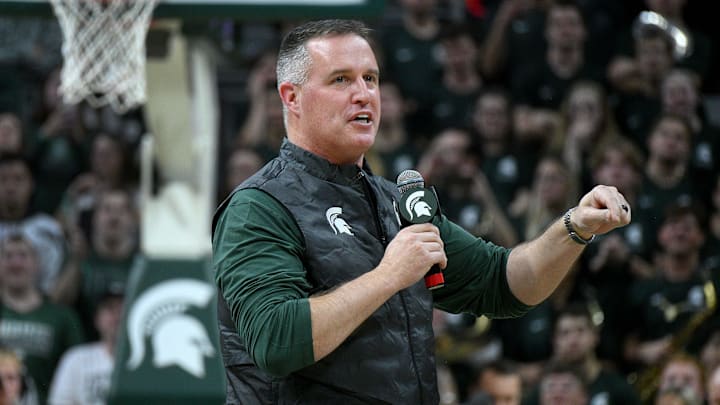 Dec 2, 2025; East Lansing, Michigan, USA;  Michigan State head football coach Pat Fitzgerald watches the Spartans defeat the Iowa Hawkeyes at Jack Breslin Student Events Center. Mandatory Credit: Dale Young-Imagn Images