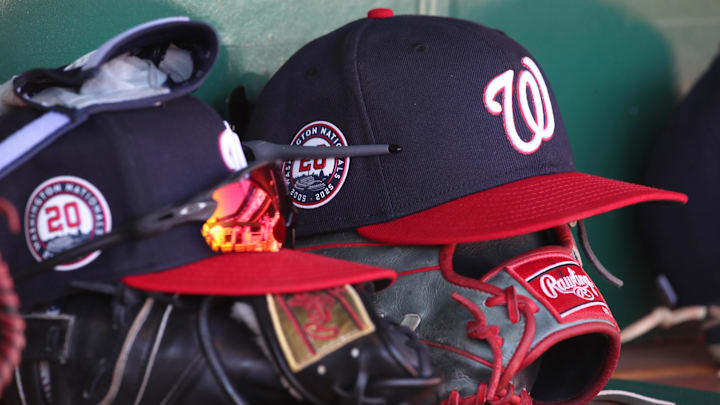 Apr 17, 2025; Pittsburgh, Pennsylvania, USA; Washington Nationals hats and gloves in the dugout against the Pittsburgh Pirates during the sixth inning at PNC Park. Apr 17, 2025; Pittsburgh, Pennsylvania, USA; Washington Nationals hats and gloves in the dugout against the Pittsburgh Pirates during the sixth inning at PNC Park.