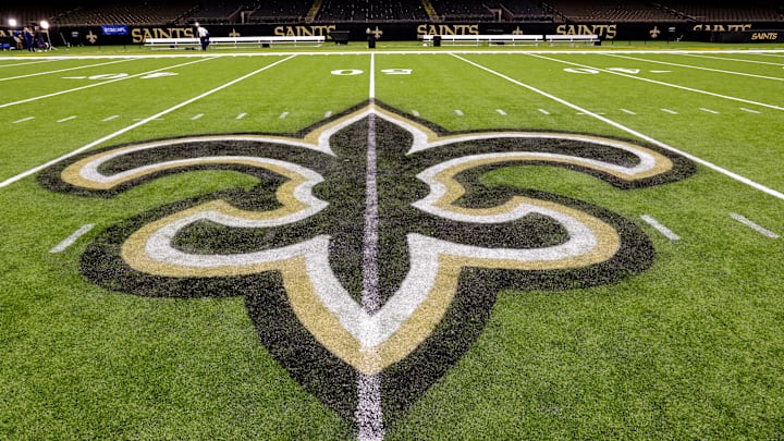 Oct 30, 2022; New Orleans, Louisiana, USA; General view of the New Orleans Saints logo as the midfield logo fleur-de-lis after the game between the New Orleans Saints and the Las Vegas Raiders at Caesars Superdome. Mandatory Credit: Stephen Lew-Imagn Images Oct 30, 2022; New Orleans, Louisiana, USA; General view of the New Orleans Saints logo as the midfield logo fleur-de-lis after the game between the New Orleans Saints and the Las Vegas Raiders at Caesars Superdome. Mandatory Credit: Stephen Lew-Imagn Images