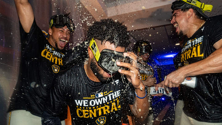 Milwaukee Brewers pitcher Frankie Montas and Milwaukee Brewers shortstop Willy Adames (27) pour champagne over Milwaukee Brewers left fielder Jackson Chourio (11) after the victory over the Philadelphia Phillies and winning the NL Central Division championship on Wednesday September 18, 2024 at American Family Field in Milwaukee, Wis. Milwaukee Brewers pitcher Frankie Montas and Milwaukee Brewers shortstop Willy Adames (27) pour champagne over Milwaukee Brewers left fielder Jackson Chourio (11) after the victory over the Philadelphia Phillies and winning the NL Central Division championship on Wednesday September 18, 2024 at American Family Field in Milwaukee, Wis.
