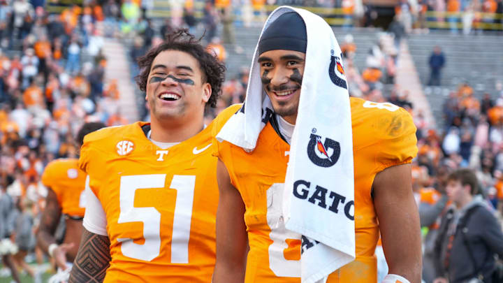 Tennessee defensive lineman Jaxson Moi (51) and Tennessee quarterback Nico Iamaleava (8) smile after winning a NCAA football game between Tennessee and UTEP in Neyland Stadium on Saturday, November 23, 2024.