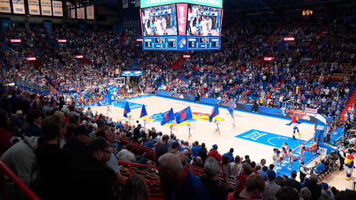 Fans yell out as the Kansas Jayhawks enter the court before the game against Texas A&M-Corpus Christi Islanders inside Allen Fieldhouse on Nov. 11, 2025.