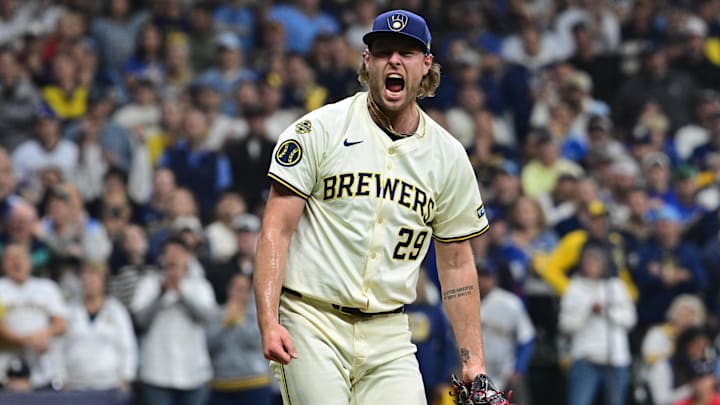Oct 13, 2025; Milwaukee, Wisconsin, USA; Milwaukee Brewers relief pitcher Trevor Megill (29) reacts after a strikeout to end the eighth inning against the Los Angeles Dodgers during game one of the NLCS round for the 2025 MLB playoffs at American Family Field. Mandatory Credit: Benny Sieu-Imagn Images Oct 13, 2025; Milwaukee, Wisconsin, USA; Milwaukee Brewers relief pitcher Trevor Megill (29) reacts after a strikeout to end the eighth inning against the Los Angeles Dodgers during game one of the NLCS round for the 2025 MLB playoffs at American Family Field. Mandatory Credit: Benny Sieu-Imagn Images
