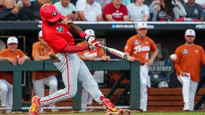 Jun 16, 2026; Omaha, NE, USA; Georgia Bulldogs third baseman Tre Phelps (1) drives in a run on a double against the Texas Longhorns during the fifth inning at Charles Schwab Field. Mandatory Credit: Dylan Widger-Imagn Images Jun 16, 2026; Omaha, NE, USA; Georgia Bulldogs third baseman Tre Phelps (1) drives in a run on a double against the Texas Longhorns during the fifth inning at Charles Schwab Field. Mandatory Credit: Dylan Widger-Imagn Images