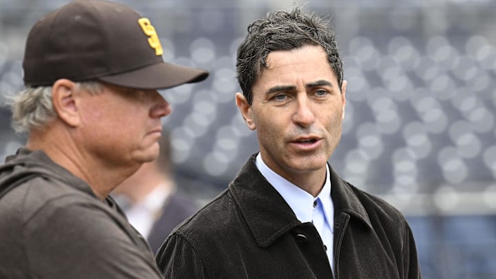 Mar 27, 2025; San Diego, California, USA; San Diego Padres general manager A.J. Preller, right, talks with manager Mike Shildt before an Opening Day baseball game between the San Diego Padres and the Atlanta Braves at Petco Park. Mandatory Credit: Denis Poroy-Imagn Images
