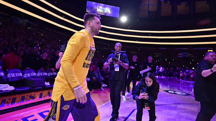 Feb 10, 2025; Los Angeles, California, USA; Los Angeles Lakers guard Luka Doncic (77) is introduced for the game against the Utah Jazz at Crypto.com Arena. Mandatory Credit: Jayne Kamin-Oncea-Imagn Images