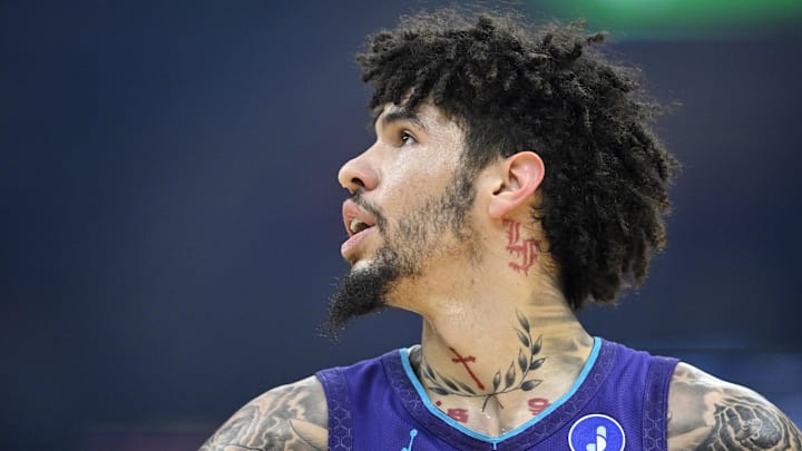 Dec 22, 2025; Cleveland, Ohio, USA; Charlotte Hornets guard Lamelo Ball (1) stands on the court in the first quarter against the Cleveland Cavaliers at Rocket Arena. Mandatory Credit: David Richard-Imagn Images