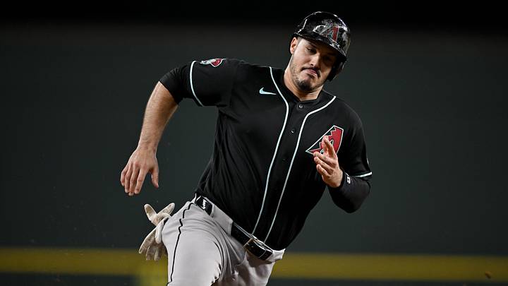 May 13, 2026; Arlington, Texas, USA;  Arizona Diamondbacks third baseman Nolan Arenado (28) scores run against the Texas Rangers ninth inning at Globe Life Field. Mandatory Credit: Jerome Miron-Imagn Images