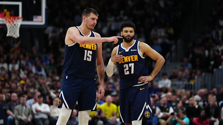 Apr 10, 2024; Denver, Colorado, USA; Denver Nuggets center Nikola Jokic (15) and guard Jamal Murray