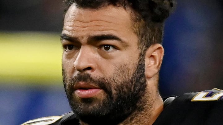 NFL Baltimore Ravens linebacker Kyle Van Noy looks on.