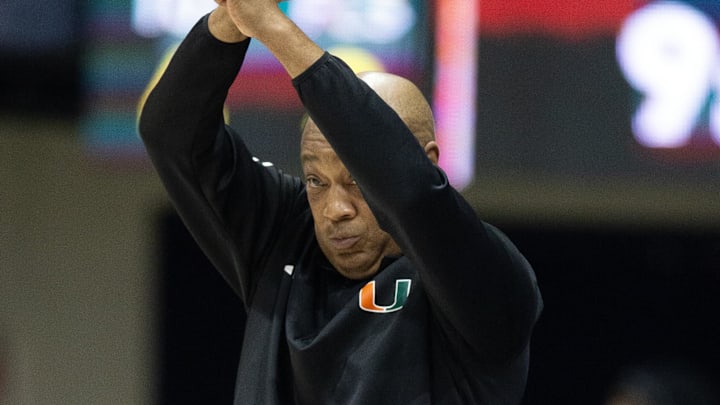 Jan 25, 2025; Berkeley, California, USA; Miami Hurricanes interim head coach Bill Courtney signals a play to his team during the first half against the California Golden Bears at Haas Pavilion. Mandatory Credit: D. Ross Cameron-Imagn Images