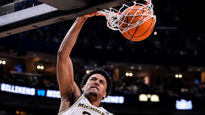 Michigan forward Yaxel Lendeborg (23) dunks against Saint Louis during the second half of NCAA Tournament Second Round at KeyBank Center in Buffalo on Saturday, March 21, 2026. Michigan forward Yaxel Lendeborg (23) dunks against Saint Louis during the second half of NCAA Tournament Second Round at KeyBank Center in Buffalo on Saturday, March 21, 2026.