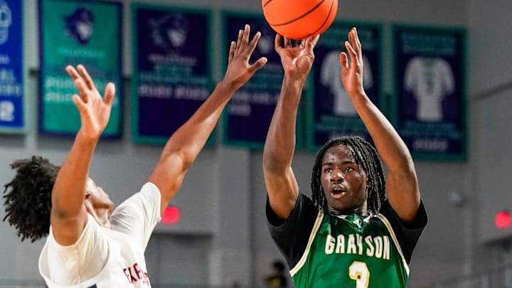 Grayson Rams guard Caleb Holt (3) shoots the ball during the second quarter of a City of Palms Classic quarterfinal game against the Columbus Explorers at Suncoast Credit Union Arena in Fort Myers, Fla., on Friday, Dec. 20, 2024.