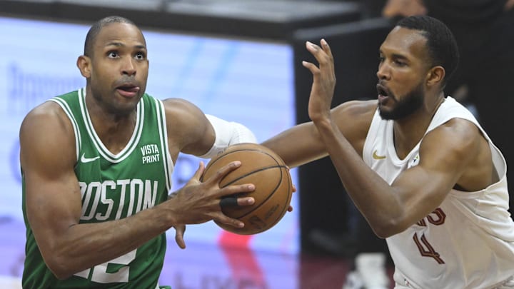 May 13, 2024; Cleveland, Ohio, USA; Boston Celtics center Al Horford (42) looks to the basket beside Cleveland Cavaliers forward Evan Mobley (4) in the first quarter of game four of the second round for the 2024 NBA playoffs at Rocket Mortgage FieldHouse. Mandatory Credit: David Richard-Imagn Images
