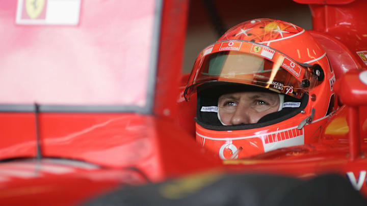 June 17, 2005; Indianapolis, IN, USA; Michael Schumacher #1 of Scuderia Ferrari Marlboro watches the scoring monitor while sitting in the cockpit of his car during the second practice session for the United States Grand Prix on Friday June 17, 2005 at the Indianpolis Motor Speedway. Mandatory Credit: Photo By Jeff Hanisch-USA TODAY Sports Copyright (c) 2005 Jeff Hanisch