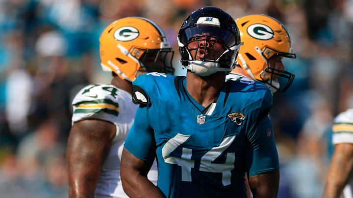 Jacksonville Jaguars defensive end Travon Walker (44) reacts to his sack on Green Bay Packers quarterback Malik Willis (2) during the fourth quarter of an NFL football matchup Sunday, Oct. 27, 2024 at EverBank Stadium in Jacksonville, Fla. The Packers edged the Jaguars 30-27 on a last-second field goal. [Corey Perrine/Florida Times-Union]