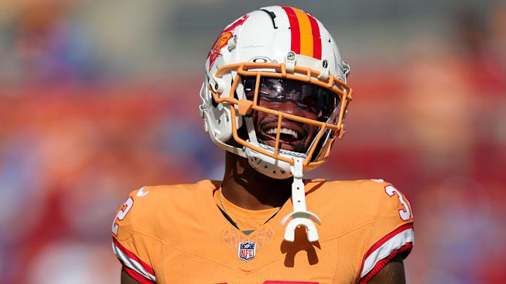 Oct 15, 2023; Tampa, Florida, USA;  Tampa Bay Buccaneers safety Josh Hayes (32) warms up before a game against the Detroit Lions at Raymond James Stadium. Mandatory Credit: Nathan Ray Seebeck-Imagn Images