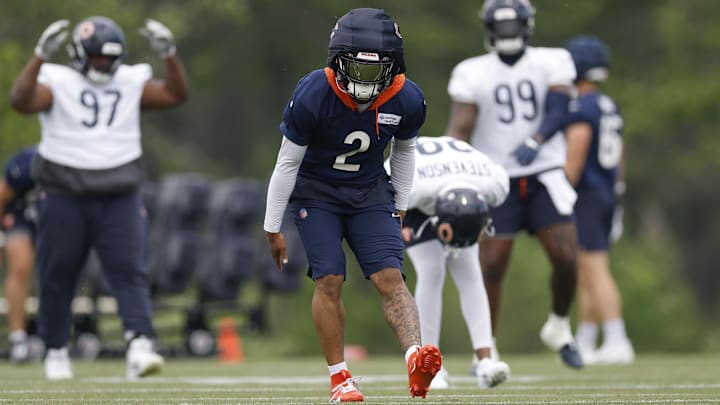 DJ Moore goes through stretching during the first day of minicamp on Tuesday.
