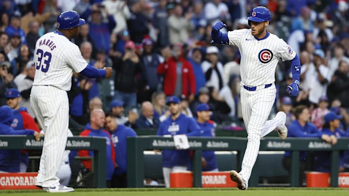 Apr 23, 2024; Chicago, Illinois, USA; Chicago Cubs outfielder Cody Bellinger (24) rounds the bases after hitting a two-run home run against the Houston Astros during the first inning at Wrigley Field.