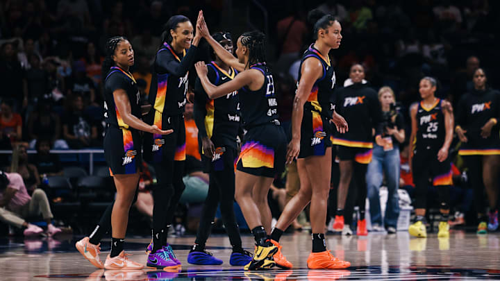 Jul 27, 2025; Washington, District of Columbia, USA; Phoenix Mercury players celebrate at the final buzzer after the game against the Washington Mystics at CareFirst Arena. Mandatory Credit: Emily Faith Morgan-Imagn Images