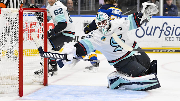 Feb 25, 2025; St. Louis, Missouri, USA;  Seattle Kraken goaltender Joey Daccord (35) gives up a goal to St. Louis Blues center Zack Bolduc (not pictured) during the second period at Enterprise Center. Mandatory Credit: Jeff Curry-Imagn Images