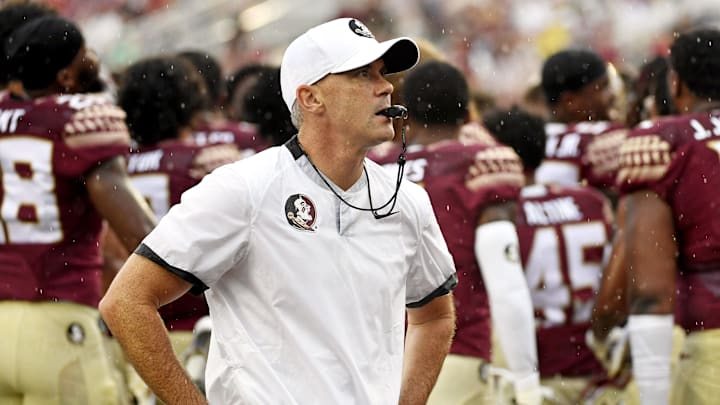 Aug 27, 2022; Tallahassee, Florida, USA; Florida State Seminoles head coach Mike Norvell leads his team before the game against the Duquesne Dukes at Doak S. Campbell Stadium. Mandatory Credit: Melina Myers-Imagn Images