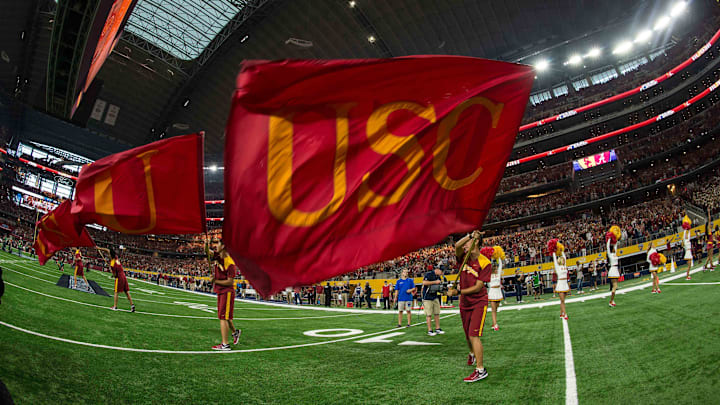 Sep 3, 2016; Arlington, TX, USA; The USC Trojans cheerleaders wave a USC flag before the game between the Alabama Crimson Tide and the USC Trojans at AT&T Stadium. Alabama defeats USC 52-6. Mandatory Credit: Jerome Miron-USA TODAY Sports