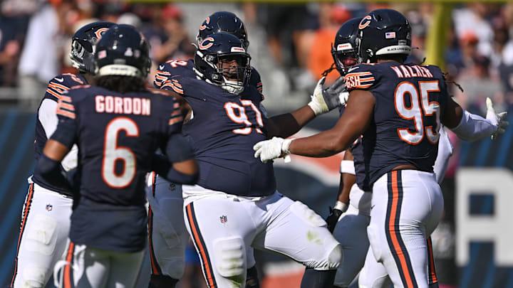 Big Andrew Billings celebrates his sack of Andy Dalton with teammates in Sunday's 36-10 win over the Panthers.