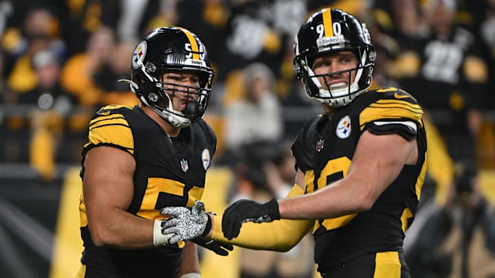 Oct 28, 2024; Pittsburgh, Pennsylvania, USA; Pittsburgh Steelers linebacker Alex Highsmith (56) celebrates with  T.J. Watt (90) after sacking New York Giants quarterback Daniel Jones (8) during the third quarter at Acrisure Stadium. Mandatory Credit: Barry Reeger-Imagn Images