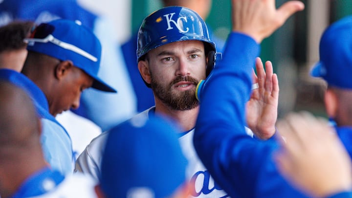 Apr 4, 2026; Kansas City, Missouri, USA; Kansas City Royals left fielder Nick Loftin (12) celebrates in the dugout after scoring during the seventh inning against the Milwaukee Brewers at Kauffman Stadium. Mandatory Credit: William Purnell-Imagn Images