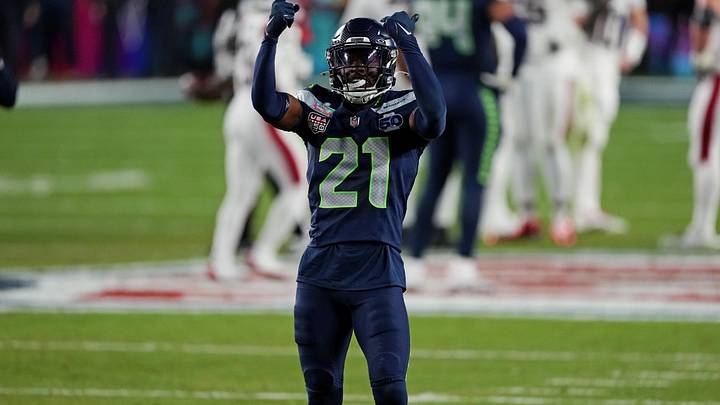 Seattle Seahawks cornerback Devon Witherspoon (21) celebrates after a play during the fourth quarter against the New England Patriots.