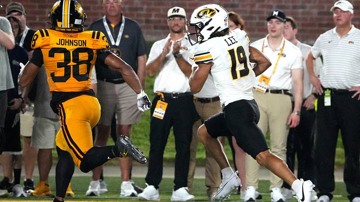 Sep 3, 2026; Columbia, Missouri, USA; Missouri Tigers wide receiver Cayden Lee (19) runs in for a touchdown past Arkansas-Pine Bluff Golden Lions defensive back Na'il Johnson (38) during the first half at Faurot Field at Memorial Stadium. Mandatory Credit: Denny Medley-Imagn Images Sep 3, 2026; Columbia, Missouri, USA; Missouri Tigers wide receiver Cayden Lee (19) runs in for a touchdown past Arkansas-Pine Bluff Golden Lions defensive back Na'il Johnson (38) during the first half at Faurot Field at Memorial Stadium. Mandatory Credit: Denny Medley-Imagn Images