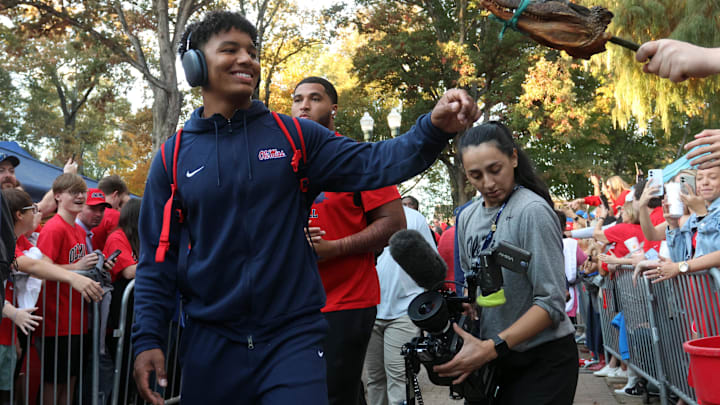 Ole Miss Rebels quarterback Trinidad Chambliss (6) shared his support of head coach Lane Kiffin despite all the rumors linking him to other programs like LSU and Florida ahead of the team's rivalry game against Mississippi State.