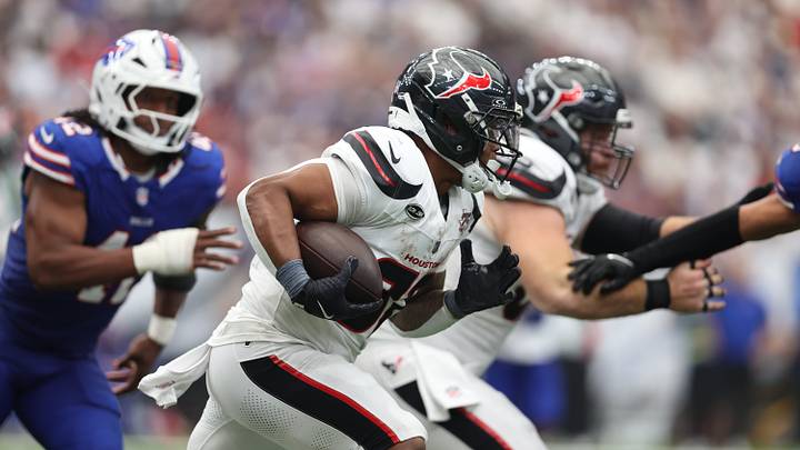 Sep 13, 2026; Houston, Texas, USA;  Houston Texans running back David Montgomery (32) runs the ball during the second half against the Buffalo Bills at Reliant Stadium.  Mandatory Credit: Troy Taormina-Imagn Images