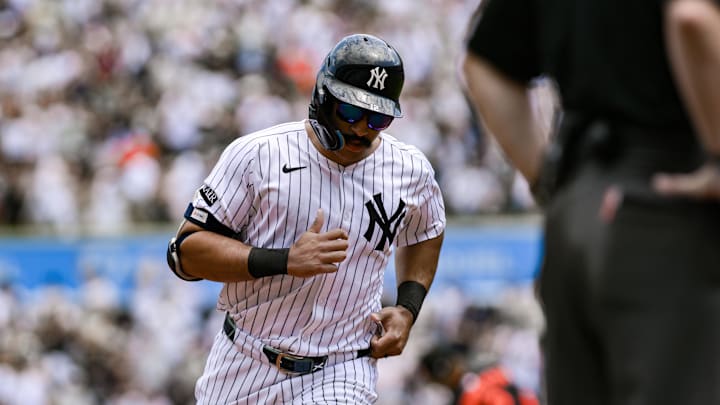 Jun 21, 2025; Bronx, New York, USA; New York Yankees outfielder Trent Grisham (12) runs the bases after hitting a solo home run against the Baltimore Orioles during the first inning at Yankee Stadium. Mandatory Credit: John Jones-Imagn Images