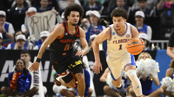 Mar 27, 2025; San Francisco, CA, USA; Florida Gators guard Walter Clayton Jr. (1) drives to the hoop past Maryland Terrapins guard JaKobi Gillespie (0) during the first half during a West Regional semifinal of the 2025 NCAA tournament at Chase Center. Mandatory Credit: Eakin Howard-Imagn Images