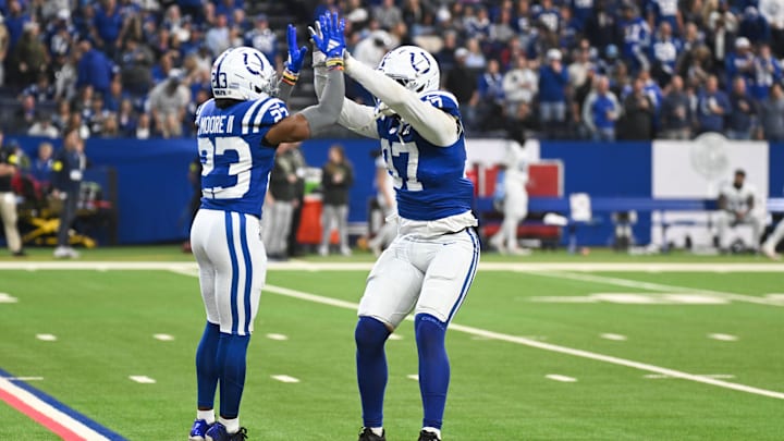 Oct 26, 2025; Indianapolis, Indiana, USA; Indianapolis Colts cornerback Kenny Moore II (23) and Indianapolis Colts defensive end Laiatu Latu (97) celebrate a sack during the first quarter against the Tennessee Titans at Lucas Oil Stadium. Mandatory Credit: Robert Goddin-Imagn Images Oct 26, 2025; Indianapolis, Indiana, USA; Indianapolis Colts cornerback Kenny Moore II (23) and Indianapolis Colts defensive end Laiatu Latu (97) celebrate a sack during the first quarter against the Tennessee Titans at Lucas Oil Stadium. Mandatory Credit: Robert Goddin-Imagn Images