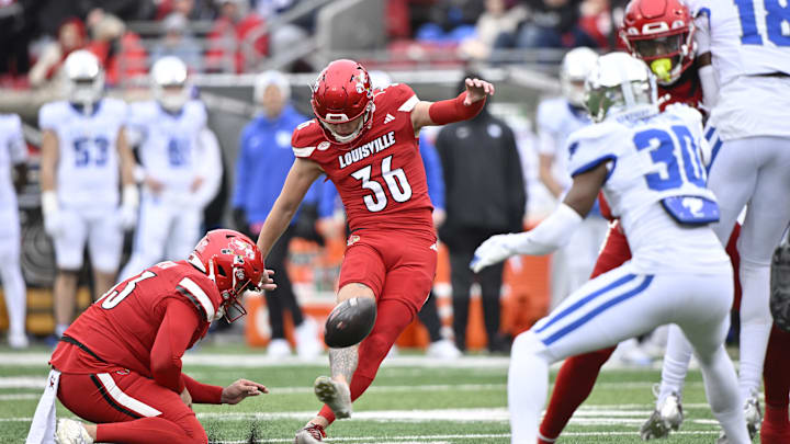 Nov 29, 2025; Louisville, Kentucky, USA; Louisville Cardinals kicker Cooper Ranvier (36) attempts a kick against the Louisville Cardinals during the first half at L&N Federal Credit Union Stadium. Louisville defeated Kentucky 41-0. Mandatory Credit: Jamie Rhodes-Imagn Images Nov 29, 2025; Louisville, Kentucky, USA; Louisville Cardinals kicker Cooper Ranvier (36) attempts a kick against the Louisville Cardinals during the first half at L&N Federal Credit Union Stadium. Louisville defeated Kentucky 41-0. Mandatory Credit: Jamie Rhodes-Imagn Images