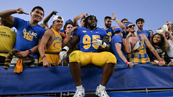 Sep 14, 2024; Pittsburgh, Pennsylvania, USA; Pittsburgh Panthers defensive lineman Francis Brewu (95) celebrates after defeating the West Virginia Mountaineers at Acrisure Stadium. Mandatory Credit: Barry Reeger-Image Images