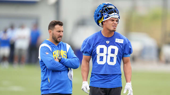 Jun 14, 2023; Thousand Oaks, CA, USA; Los Angeles Rams tight ends coach Nick Caley and tight end Brycen Hopkins (88) during minicamp at Cal Lutheran University. Mandatory Credit: Kirby Lee-Imagn Images