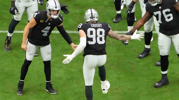 Sep 26, 2021; Paradise, Nevada, USA; Las Vegas Raiders defensive end Maxx Crosby (98) is greeted by