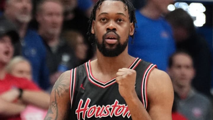 Houston Cougars forward J'Wan Roberts (13) celebrates after scoring against the Kansas Jayhawks during the second half at Allen Fieldhouse.