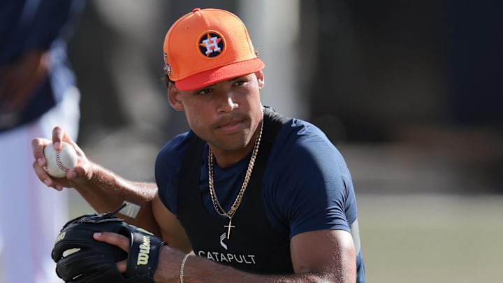 Feb 14, 2025; West Palm Beach, FL, USA; Houston Astros infielder Cam Smith (90) works out during spring training at CACTI Park of the Palm Beaches.