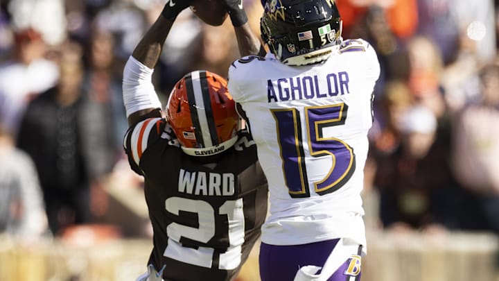 Oct 27, 2024; Cleveland, Ohio, USA; Cleveland Browns cornerback Denzel Ward (21) breaks up a pass intended for Baltimore Ravens wide receiver Nelson Agholor (15) during the second quarter at Huntington Bank Field. Mandatory Credit: Scott Galvin-Imagn Images Oct 27, 2024; Cleveland, Ohio, USA; Cleveland Browns cornerback Denzel Ward (21) breaks up a pass intended for Baltimore Ravens wide receiver Nelson Agholor (15) during the second quarter at Huntington Bank Field. Mandatory Credit: Scott Galvin-Imagn Images