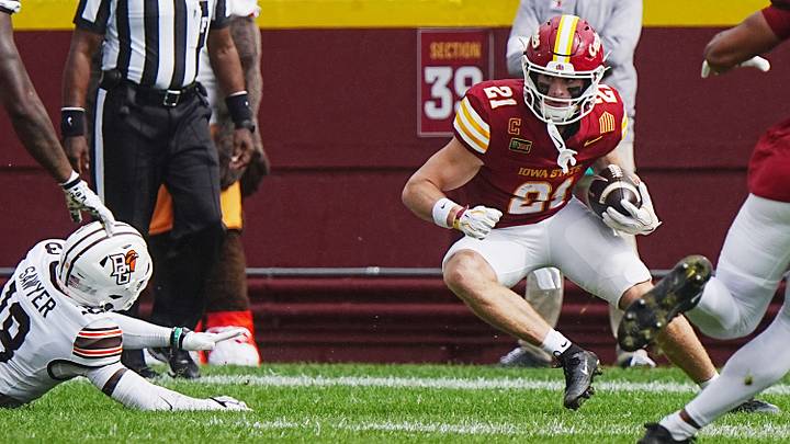 Iowa State punt returner Aiden Flora (21) breaks a tackle attempt by Bowling Green Falcons special team player Nick Sawyer (18) during a first-quarter punt return on Sept. 19, 2026, at Jack Trice Stadium in Ames, Iowa. Iowa State punt returner Aiden Flora (21) breaks a tackle attempt by Bowling Green Falcons special team player Nick Sawyer (18) during a first-quarter punt return on Sept. 19, 2026, at Jack Trice Stadium in Ames, Iowa.