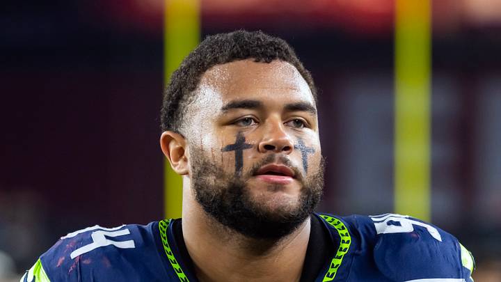 Seattle Seahawks defensive end Mike Morris walks off the field Seattle Seahawks defensive end Mike Morris walks off the field